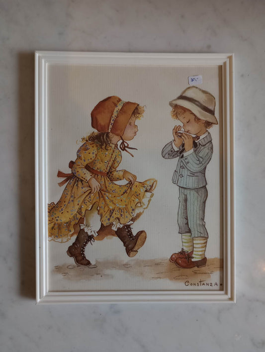 Billede i ramme: Pige danser, dreng spiller mundharmonika